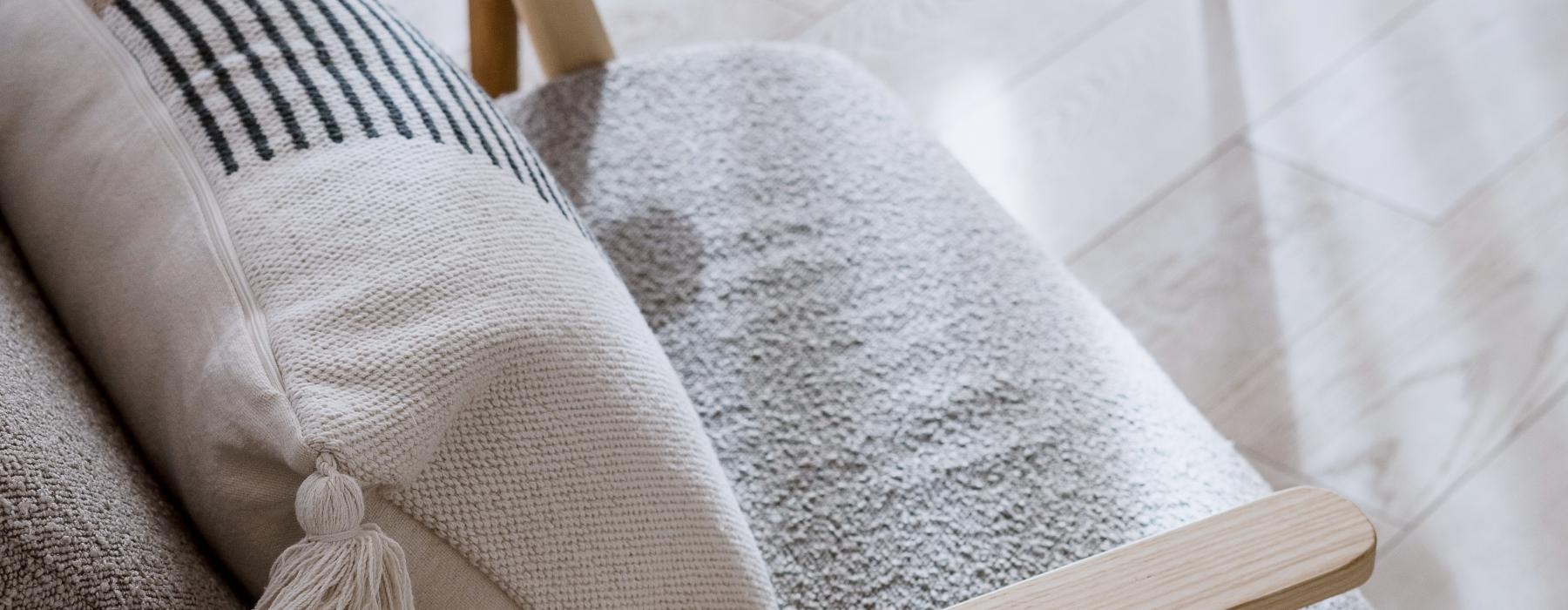 a chair with a pillow on it