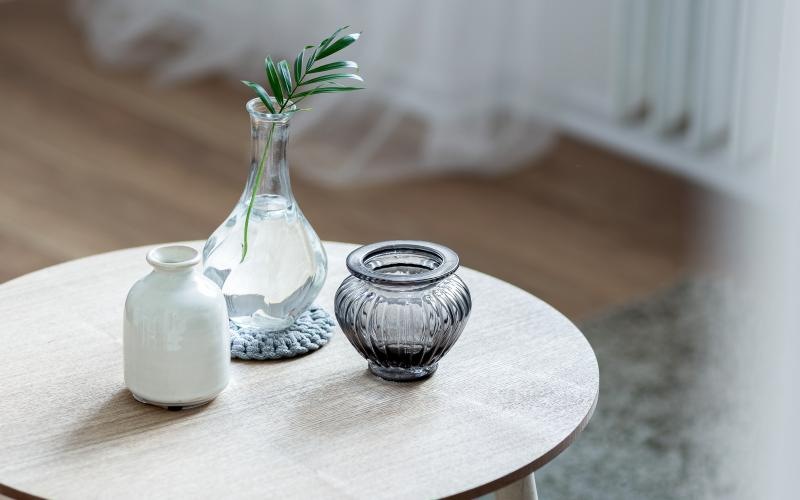 a table with a vases on it